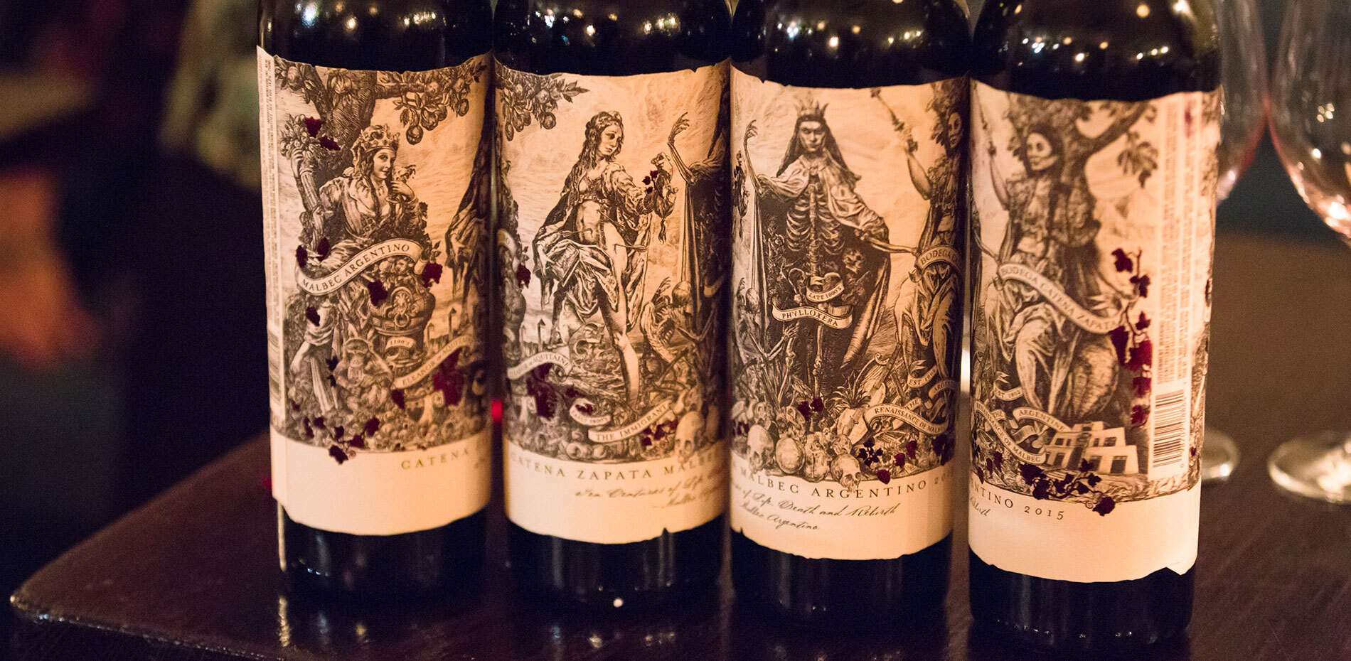 Four vintage labels of Catena Zapata Malbec Argentino lined up